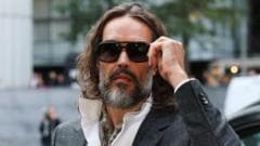 Russell Brand arrives at court for start of rape trial